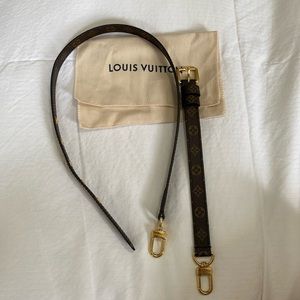 Louis Vuitton adjustable strap.